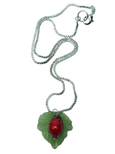 Load image into Gallery viewer, Ladybird on leaf pendant on silver plated chain - momola