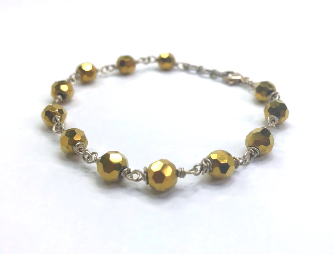 Golden faceted glass crystal bracelet - momola